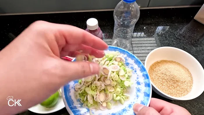 Prepare ingredients: finely slice lemongrass, roughly chop shallots, garlic and chilies.
