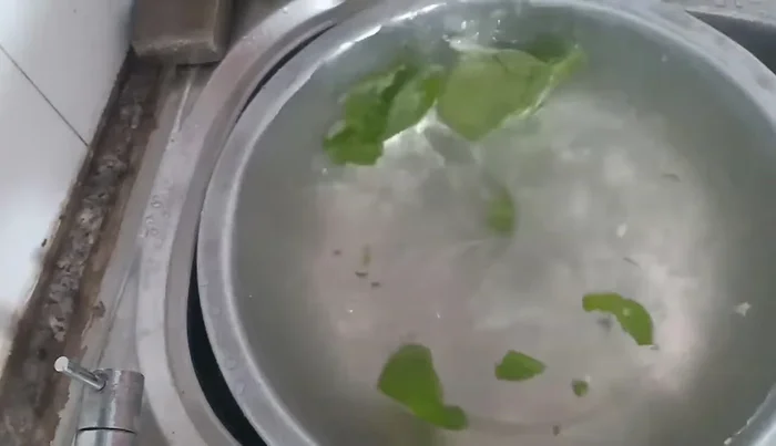 Boil a pot of water. Add a little salt to the boiling water.