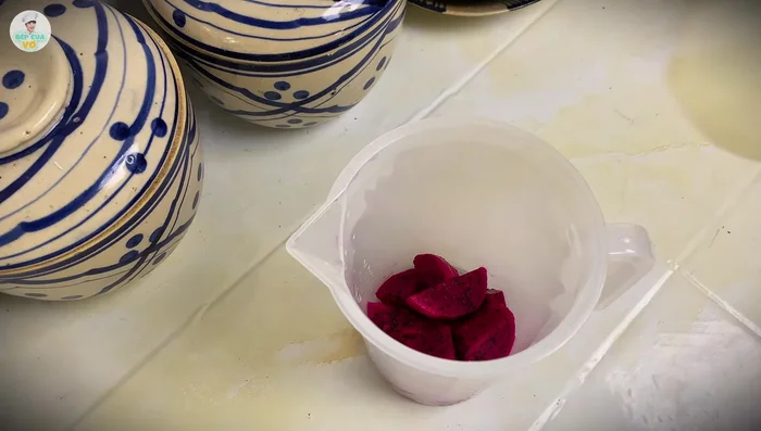 Blend 100g of red dragon fruit pulp until smooth and sieve to remove seeds.
