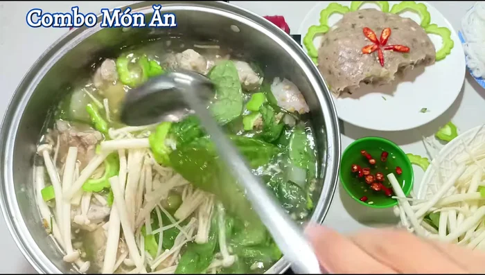 Add vegetables and the fish cakes to the hotpot broth. Simmer for 1-2 minutes before serving.